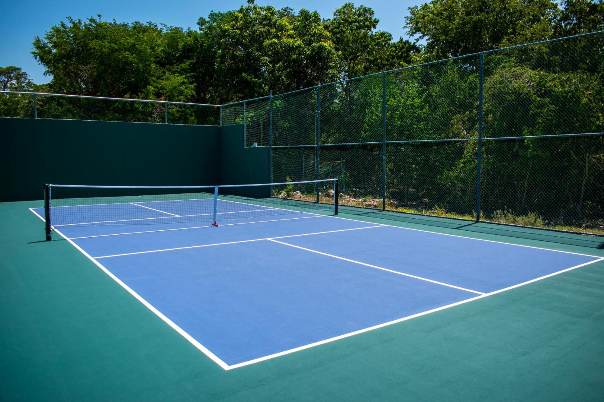 グランド リビエラ プリンセス オール インクルーシブ プレヤデルカーメン エクステリア 写真 A tennis court
